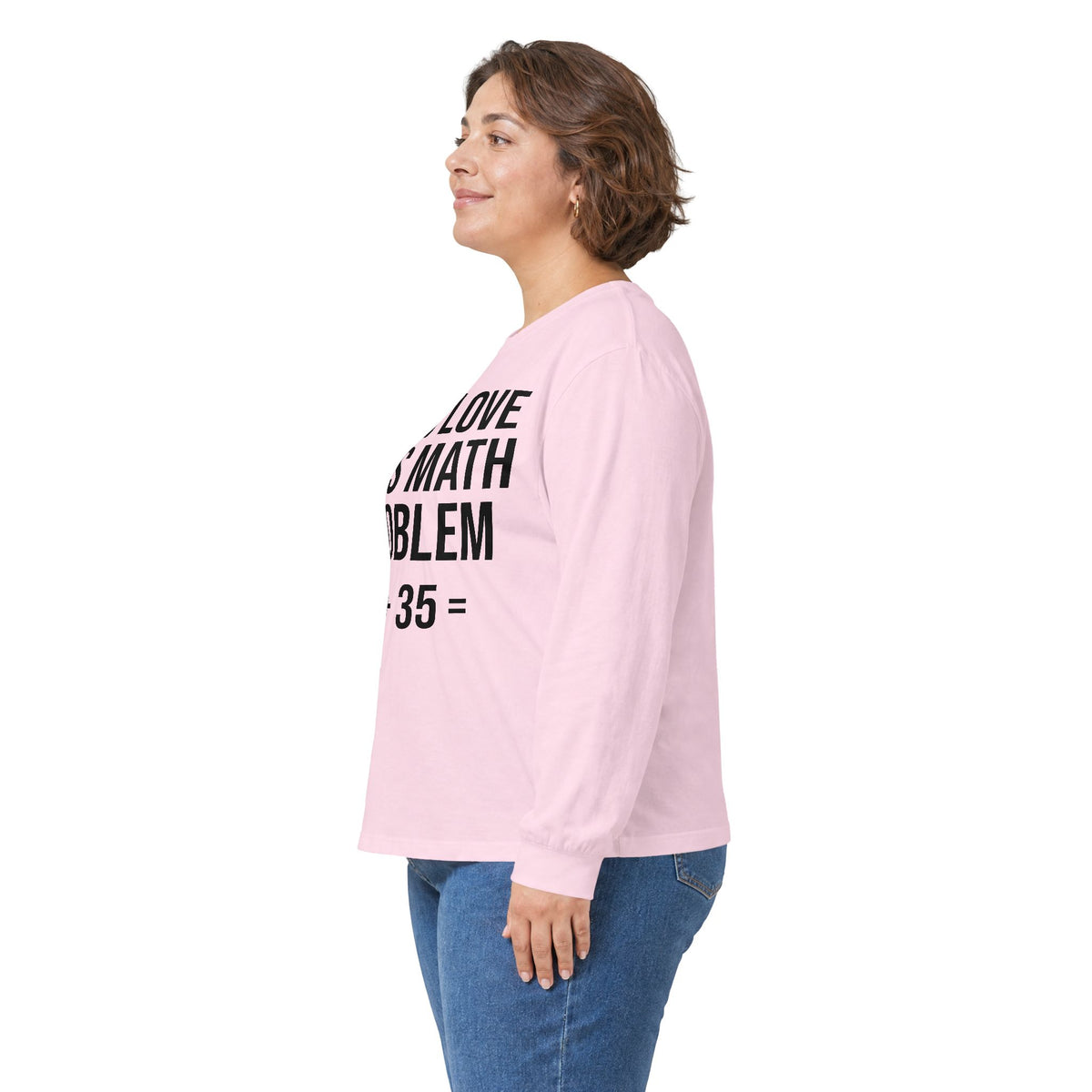 A woman shown in side profile wearing a light pink long-sleeve t-shirt with black text that reads 'I LOVE MY MATH PROBLEM = 35 =' and blue jeans, against a plain white background.