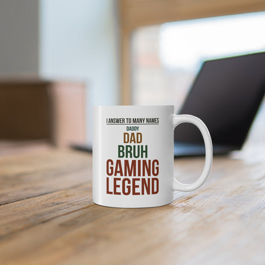 I Answer to Many Names — Daddy. Dad. Bruh. Gaming Legend — Coffee Mug (11 oz)