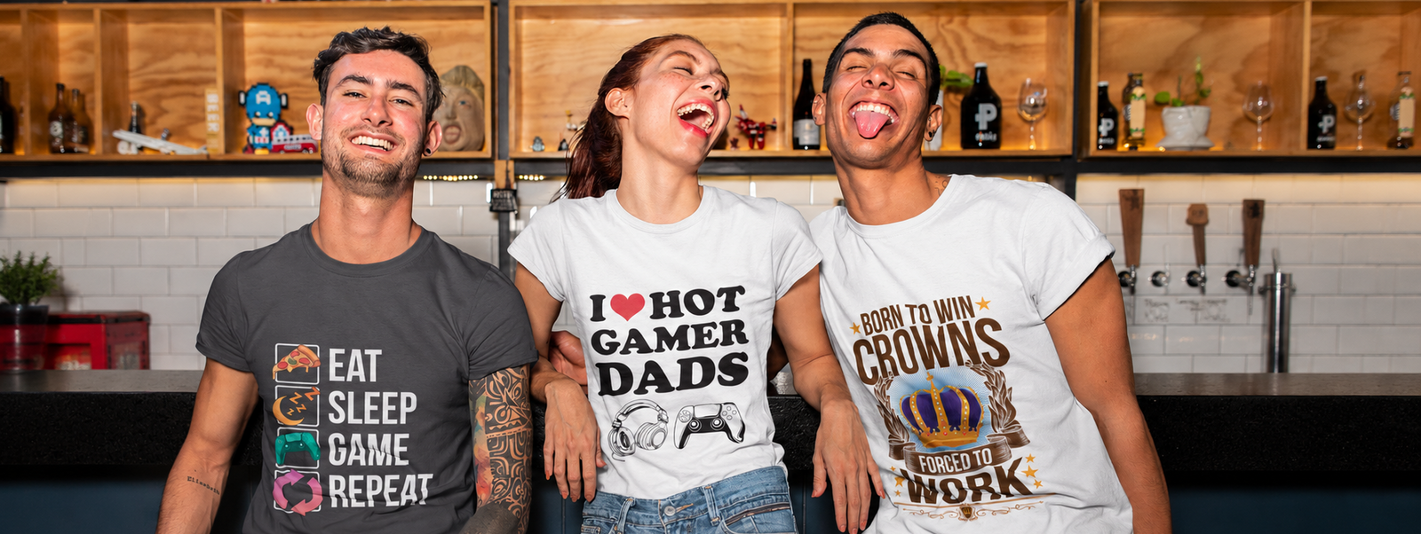 Three people wearing printed Try Hard graphic tees in a kitchen
