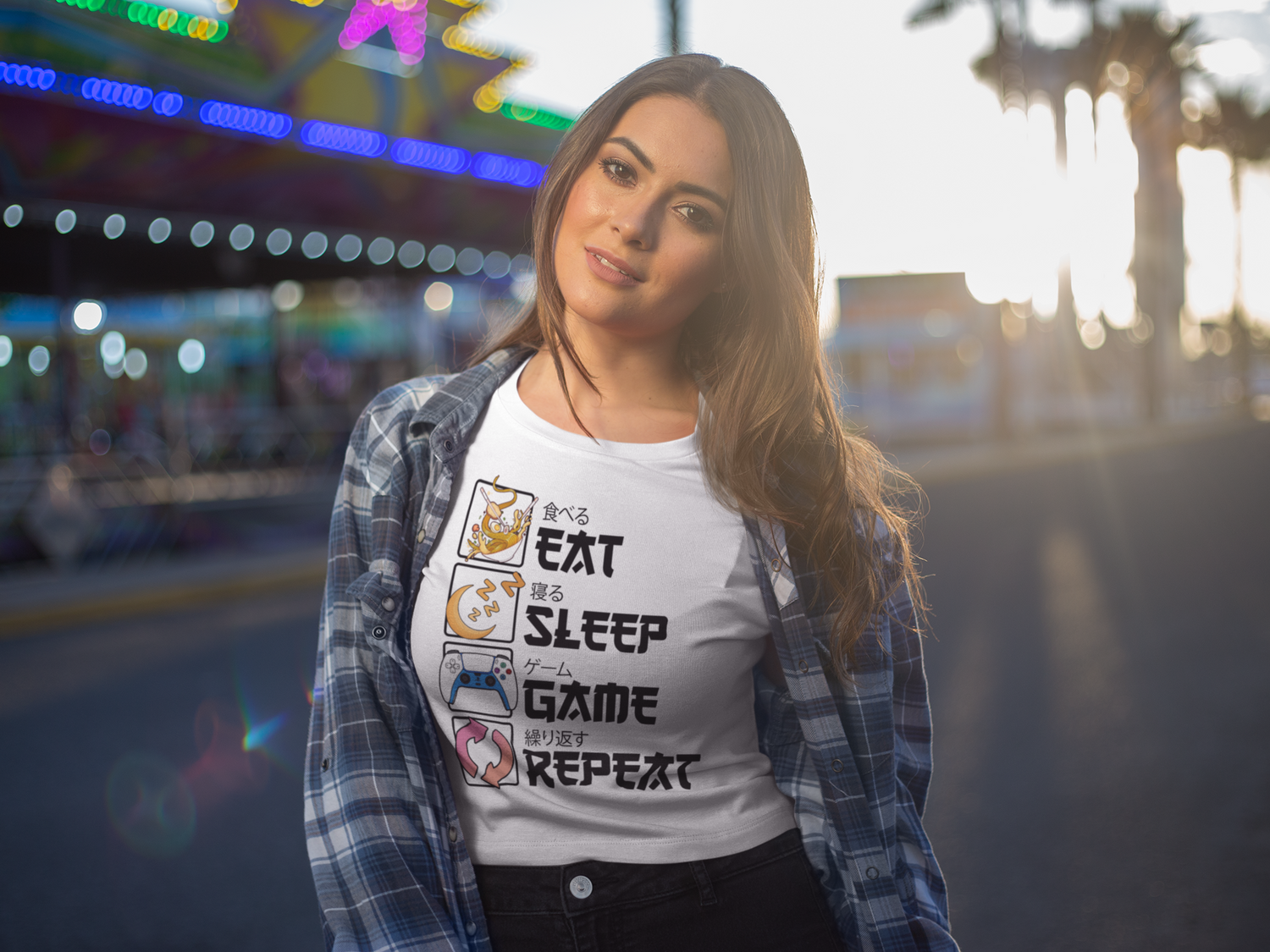Woman wearing a t-shirt with gaming text in an outdoor setting